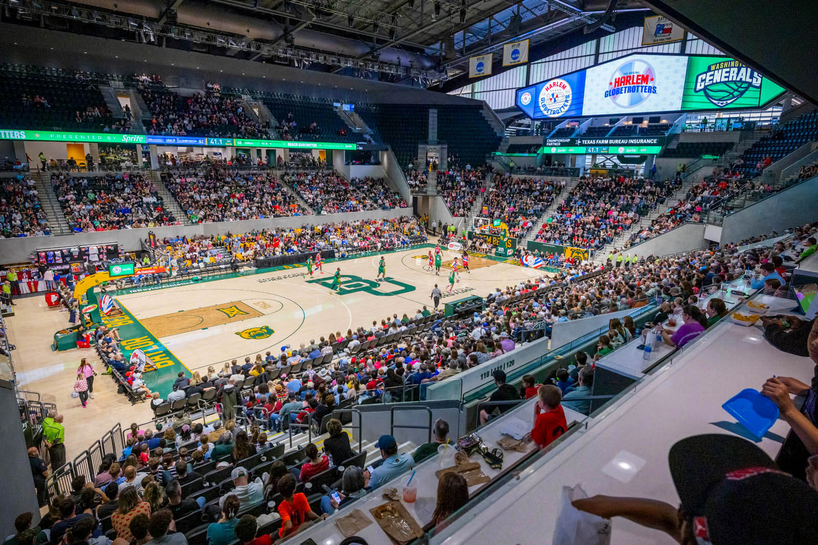 A crowd enjoys the Harlem Globetrotters at the Foster Pavilion